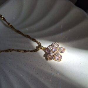 Collar giratorio - Flor rosada